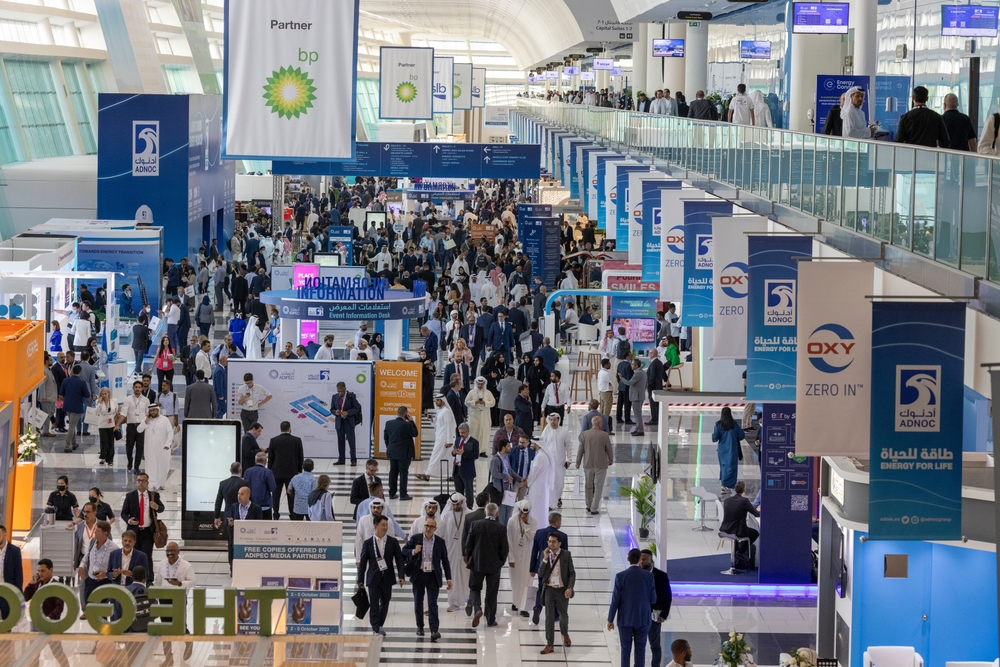 International exhibition hall crowded with global exhibitors and visitors